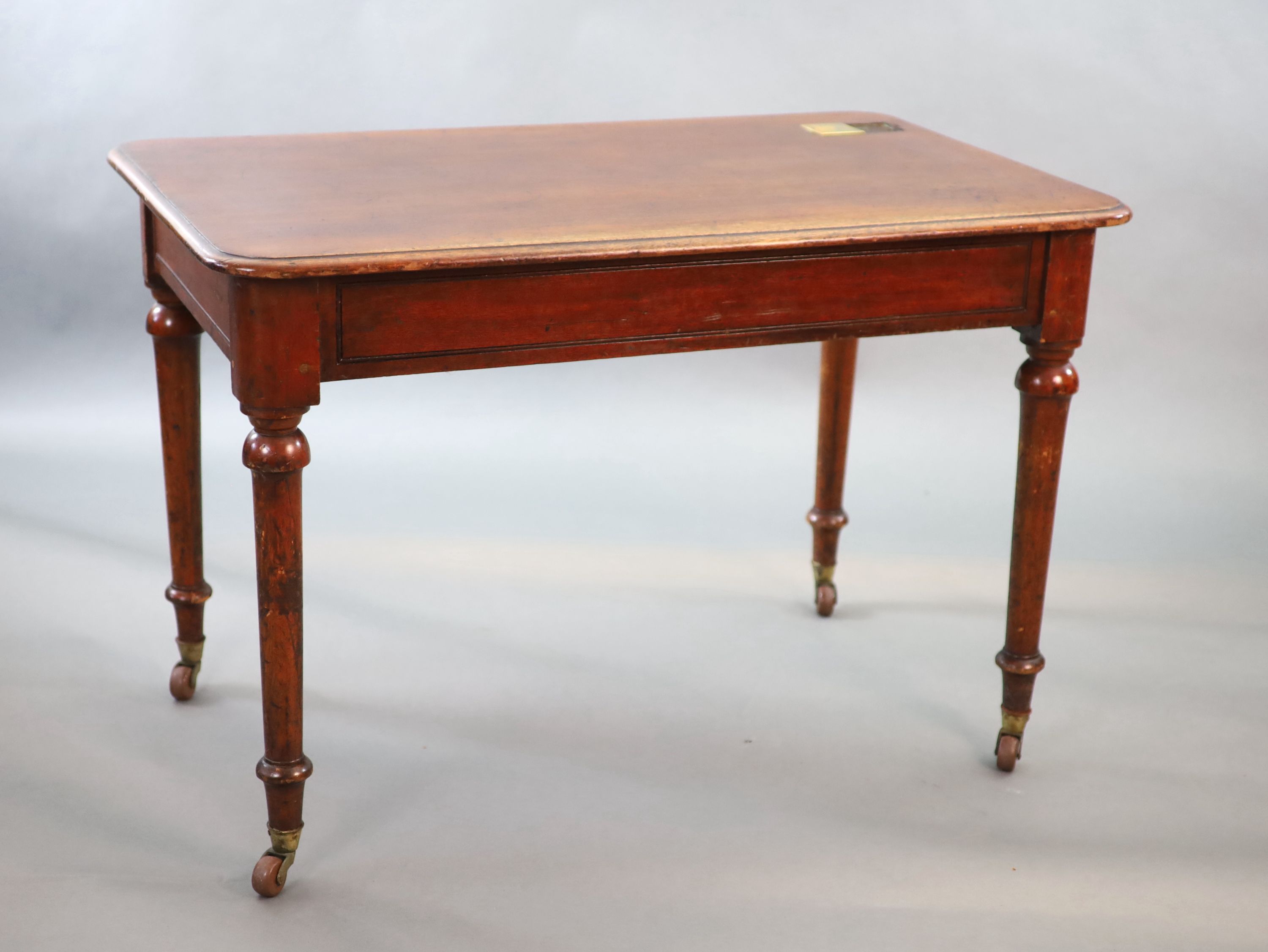 A Victorian mahogany writing table, W.114 D.70cm H.76cm